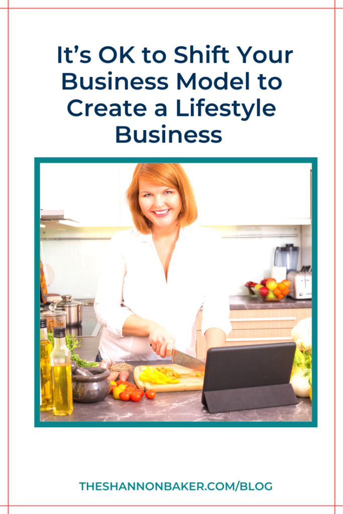 The words " It’s OK to Shift Your Business Model to Create a Lifestyle Business " above image of a woman preparing food in the kitchen and there is a tablet on the counter