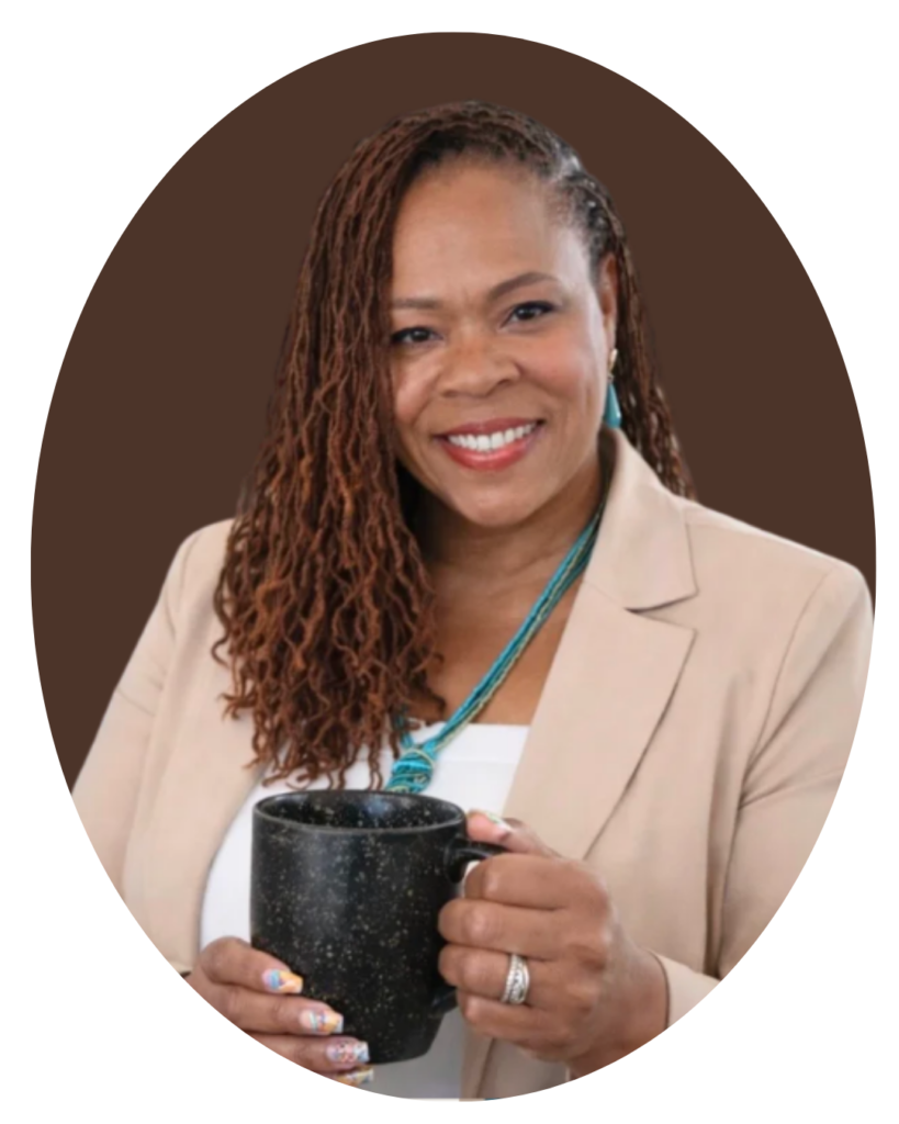 Shannon Baker holding a coffee mug for the free Make Your Business Need Less of You in 5 Days email experience.